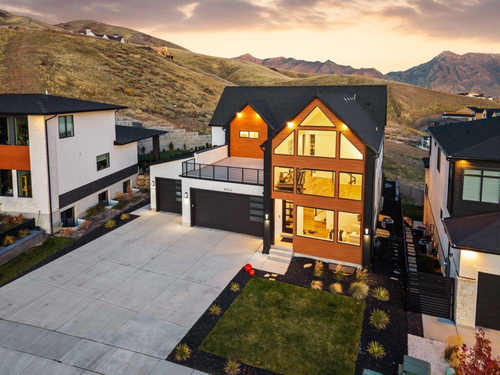 Homes in Utah with the Wasatch Mountains behind them, representing Utah mortgage solutions from Jamie Nielsen and VanDyk Mortgage